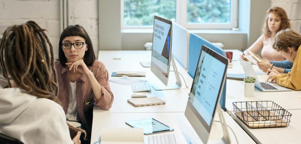 people in front of the computers